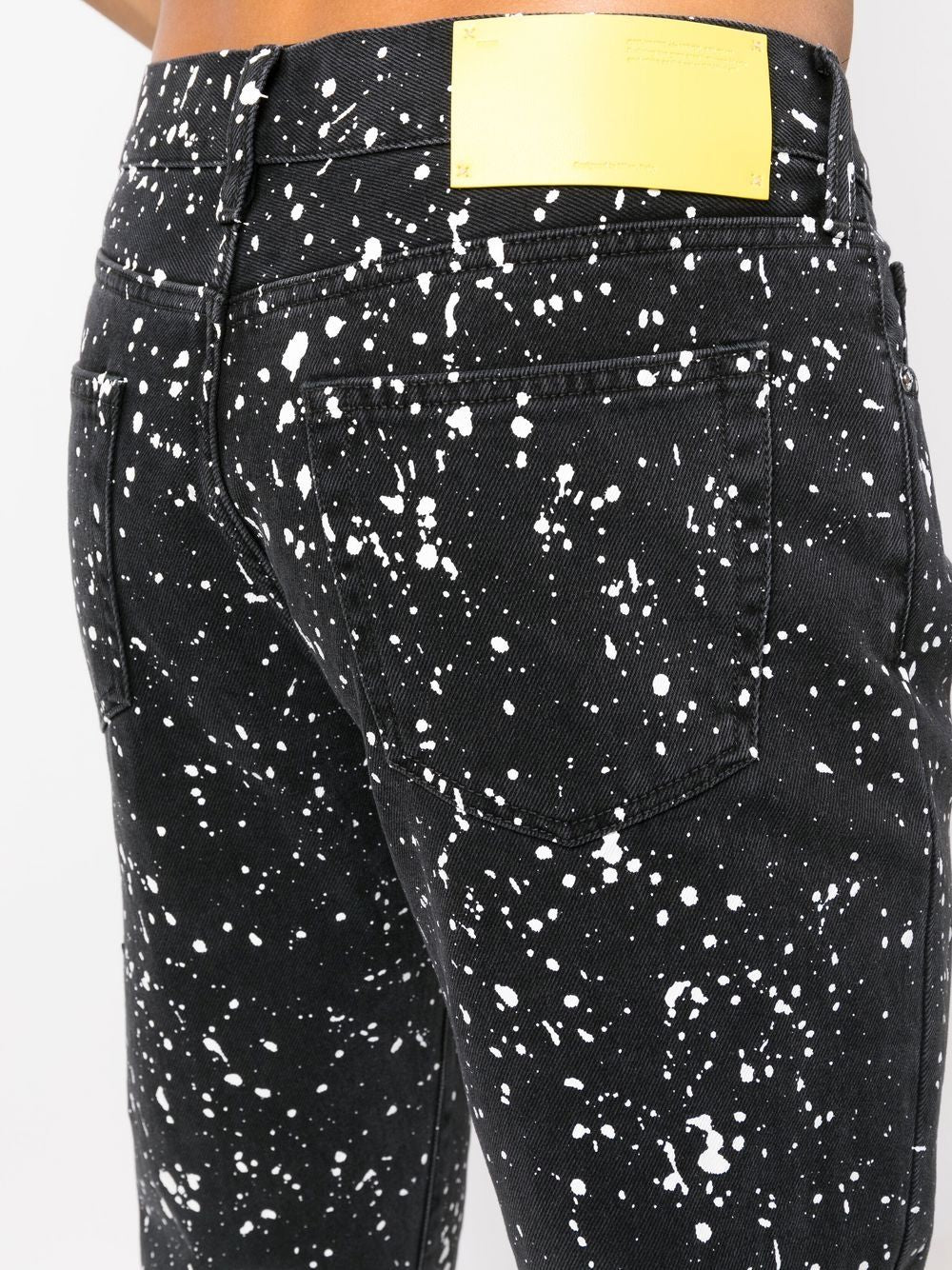 Off-White Diag-stripe paint-splatter skinny jeans