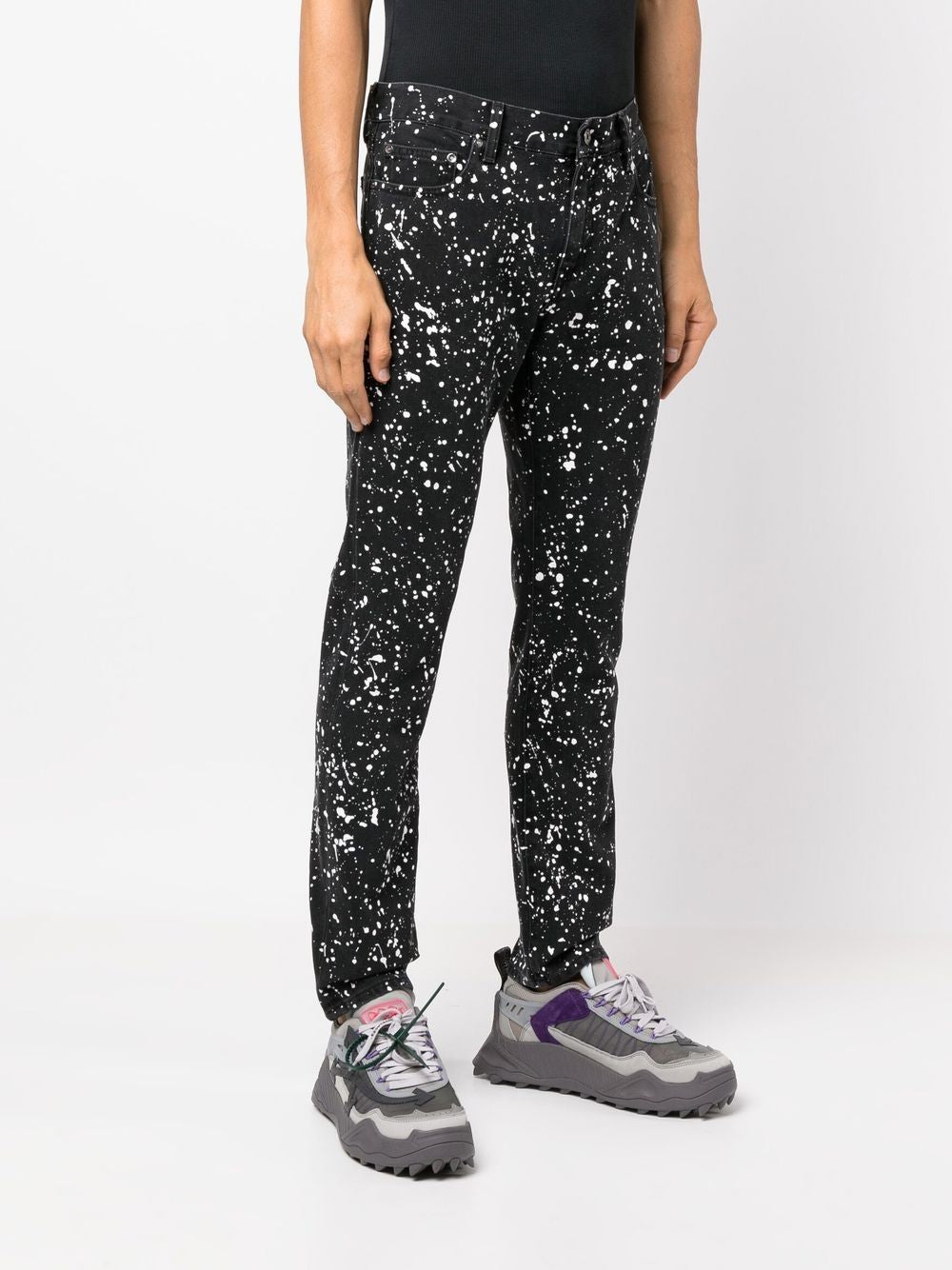 Off-White Diag-stripe paint-splatter skinny jeans