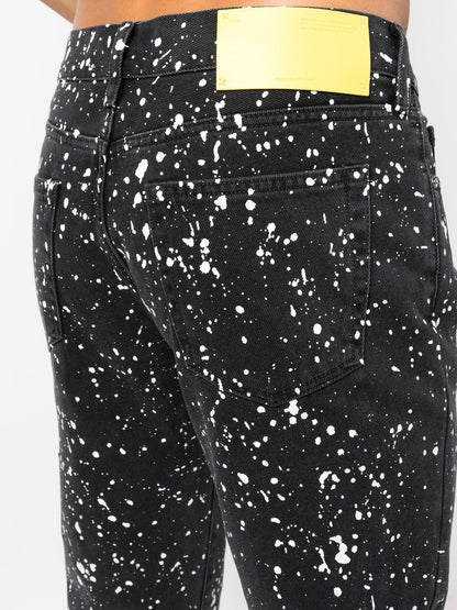 Off-White Diag-stripe paint-splatter skinny jeans